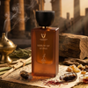 Serum of Kyphi perfume bottle on a rustic background with incense and herbs.